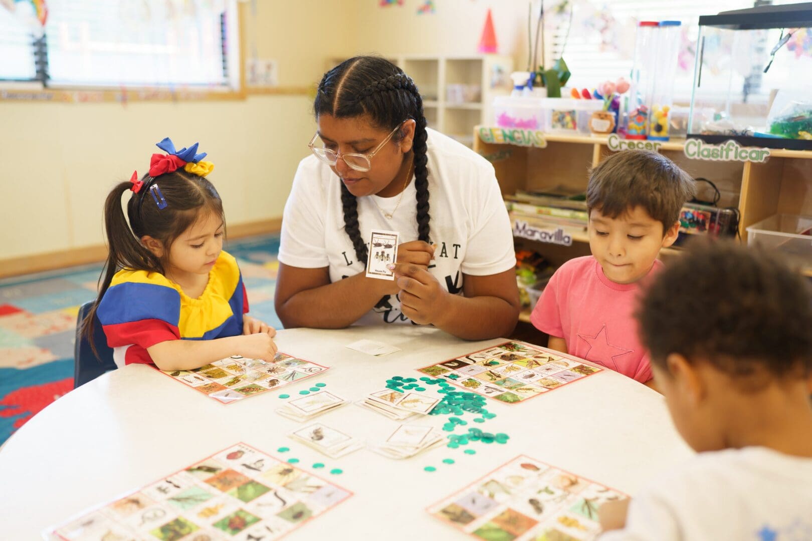 Children engaged in a learning game together.