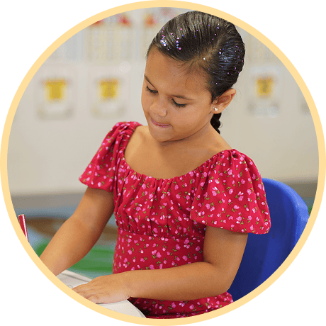 Child engaged in reading activity